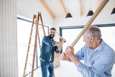 two-men-having-fun-when-furnishing-new-house-a-ne-2023-11-27-05-30-36-utc two-men-having-fun-when-furnishing-new-house-a-ne-2023-11-27-05-30-36-utc